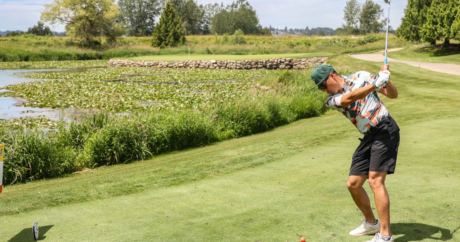 RMH BC Golfer swinging at Northview Golf Course
